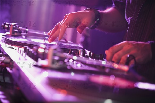 Close up of Hispanic nightclub dj