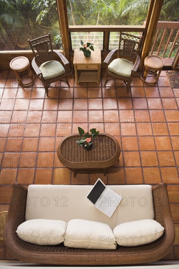 High angle view of empty livingroom with laptop on sofa