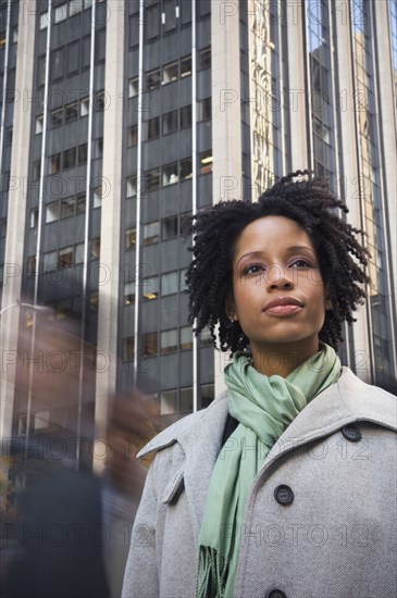 African American woman in urban scene