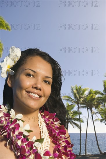 Pacific Islander woman wearing lei