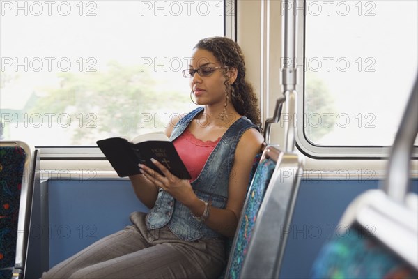 African woman reading bible