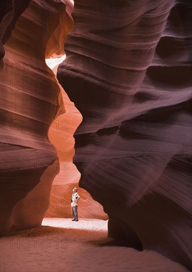 Senior man standing in Antelope Canyon