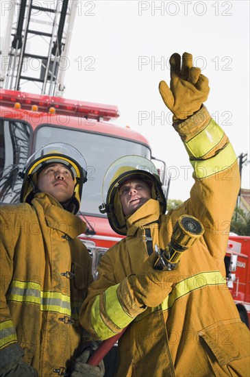 Firefighters putting out fire