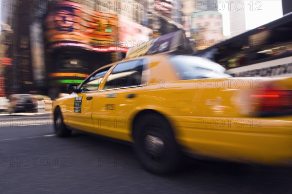 Speeding taxi in city