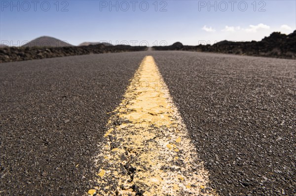 Highway through barren landscape