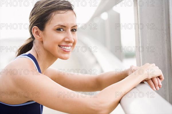 Hispanic woman resting after exercise