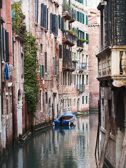 Boat moored in ornate canal