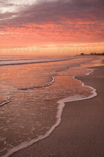 Sunset over tranquil beach