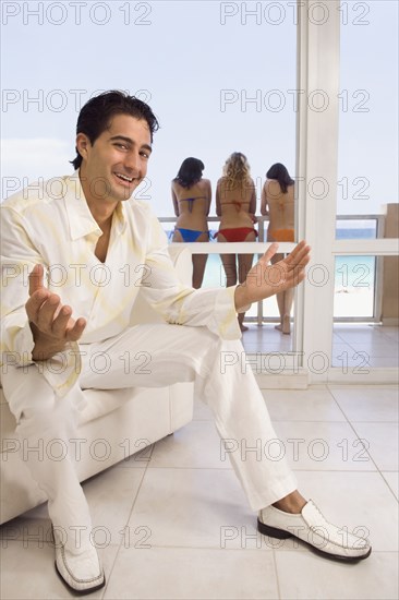 Caucasian man sitting in armchair