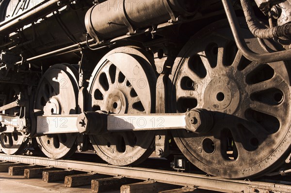 Close up of train wheels on tracks