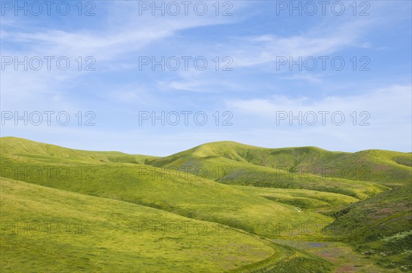 Hills and blue sky in rolling landscape