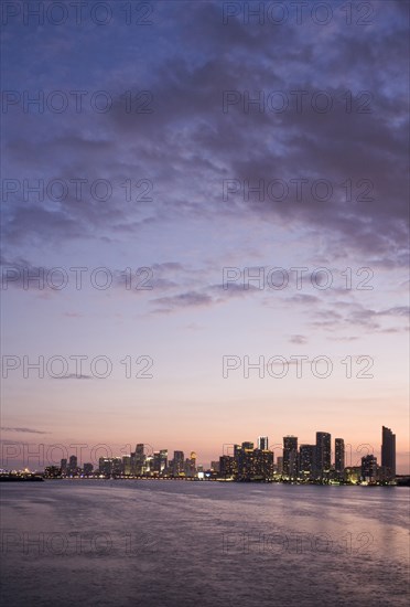 Miami city skyline and harbor at sunset