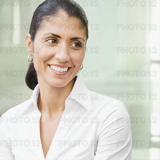 Portrait of smiling Mixed Race businesswoman