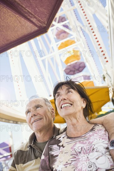 Senior couple in amusement park