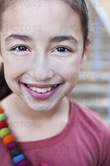 Smiling mixed race girl