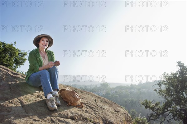 Caucasian woman hiking in remote area