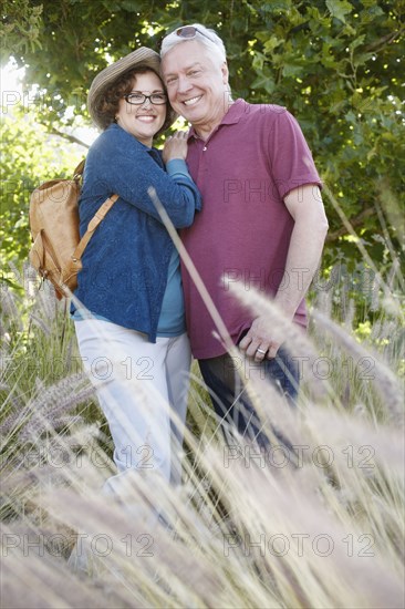 Caucasian couple hiking in remote area