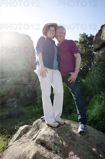 Caucasian couple hiking in remote area