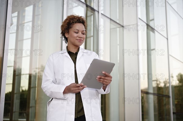 Doctor using digital tablet