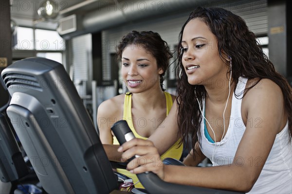 Women exercising in health club