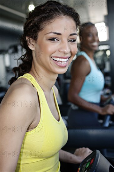 Women exercising in health club