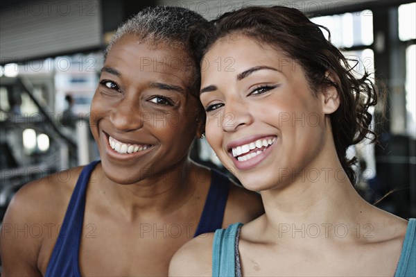 Smiling women in health club