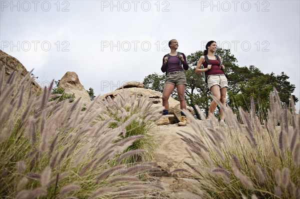 Mother and daughter hiking together