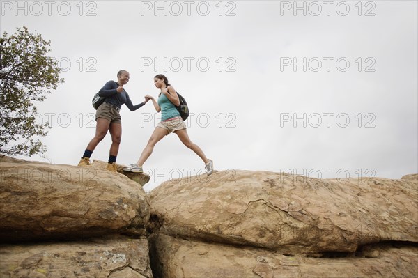 Mother and daughter hiking together