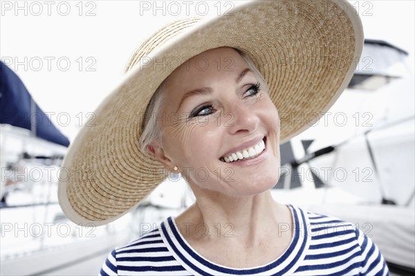 Smiling woman enjoying marina