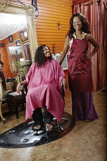 Woman having hair done in beauty salon