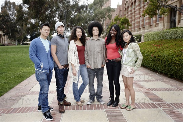 College students standing on campus walkway