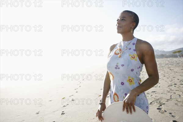Black woman enjoying the beach