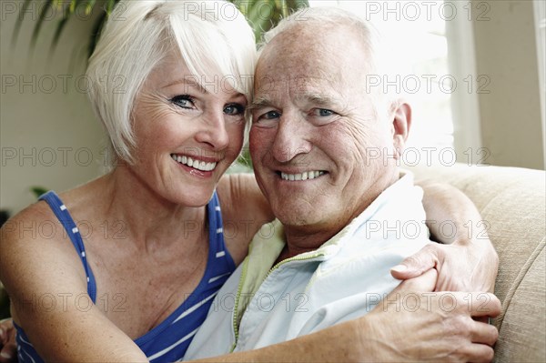Caucasian couple hugging