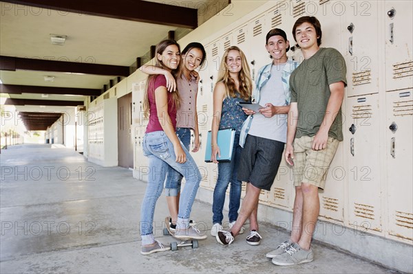 School friends hanging out in portico