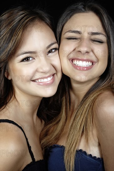 Smiling mixed race friends