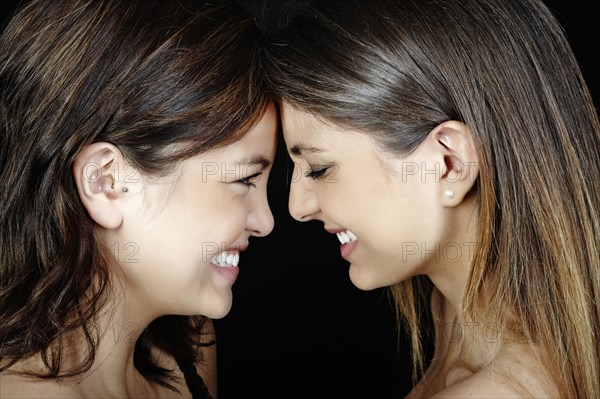 Smiling mixed race friends