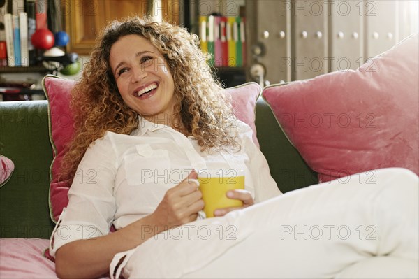 Caucasian woman drinking coffee