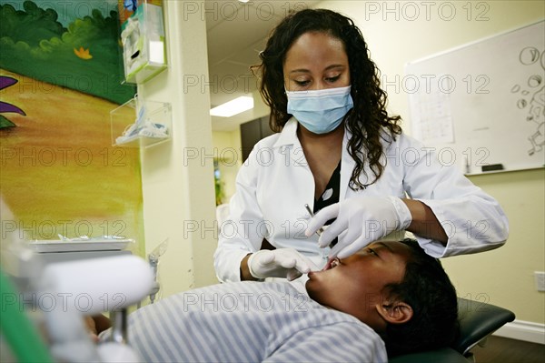 Dentist and patient in dental office