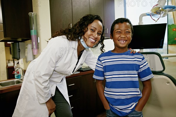 Dentist and patient in dental office