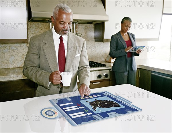 Businessman using computer in table