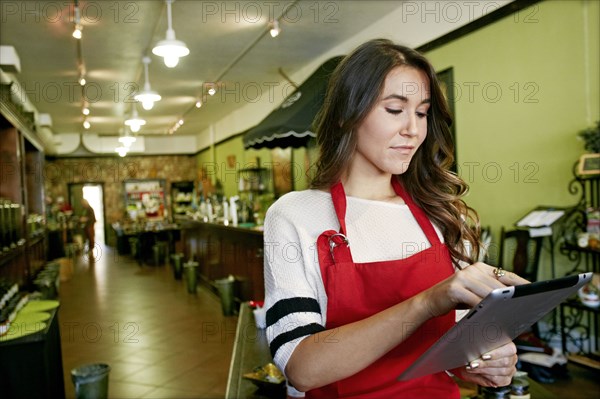 Woman working in grocery store