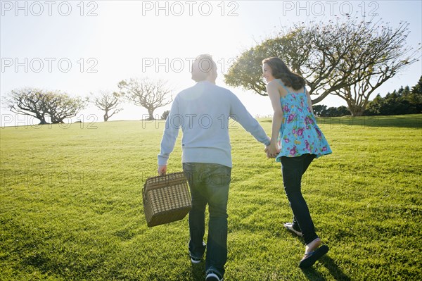 Couple having picnic in park