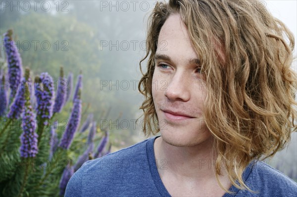 Caucasian man standing outdoors