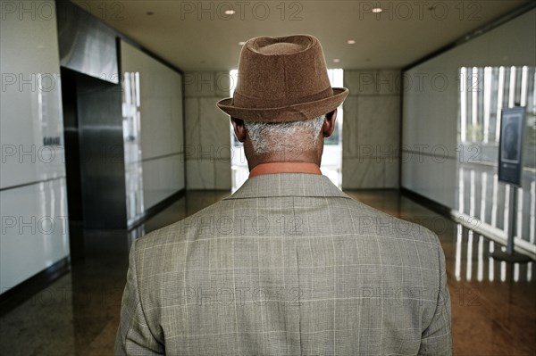 Black businessman standing in office