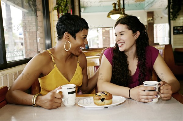Women having coffee together in restaurant