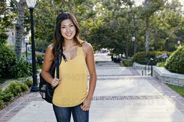 Korean student smiling on campus
