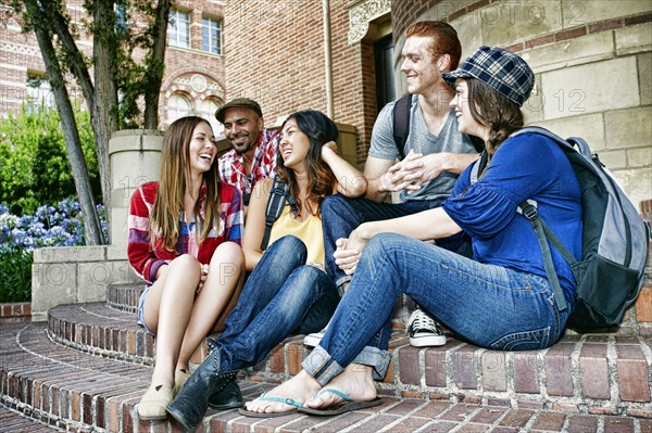 Students talking on campus steps