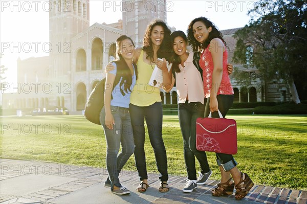 Students smiling together on campus