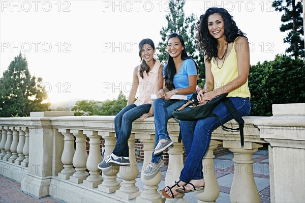 Students smiling together on campus