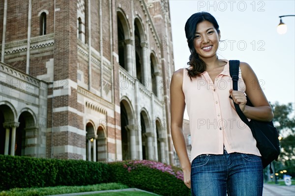 Korean student smiling on campus